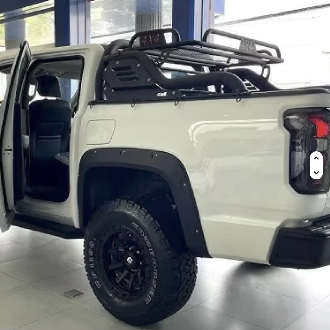 Rely R8 pickup fitted with a gantry roll bar and cargo rack
